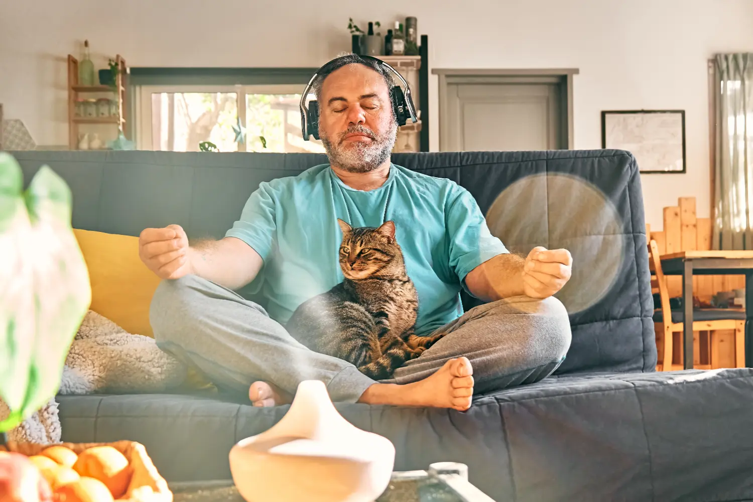 Mature middle aged man with cat